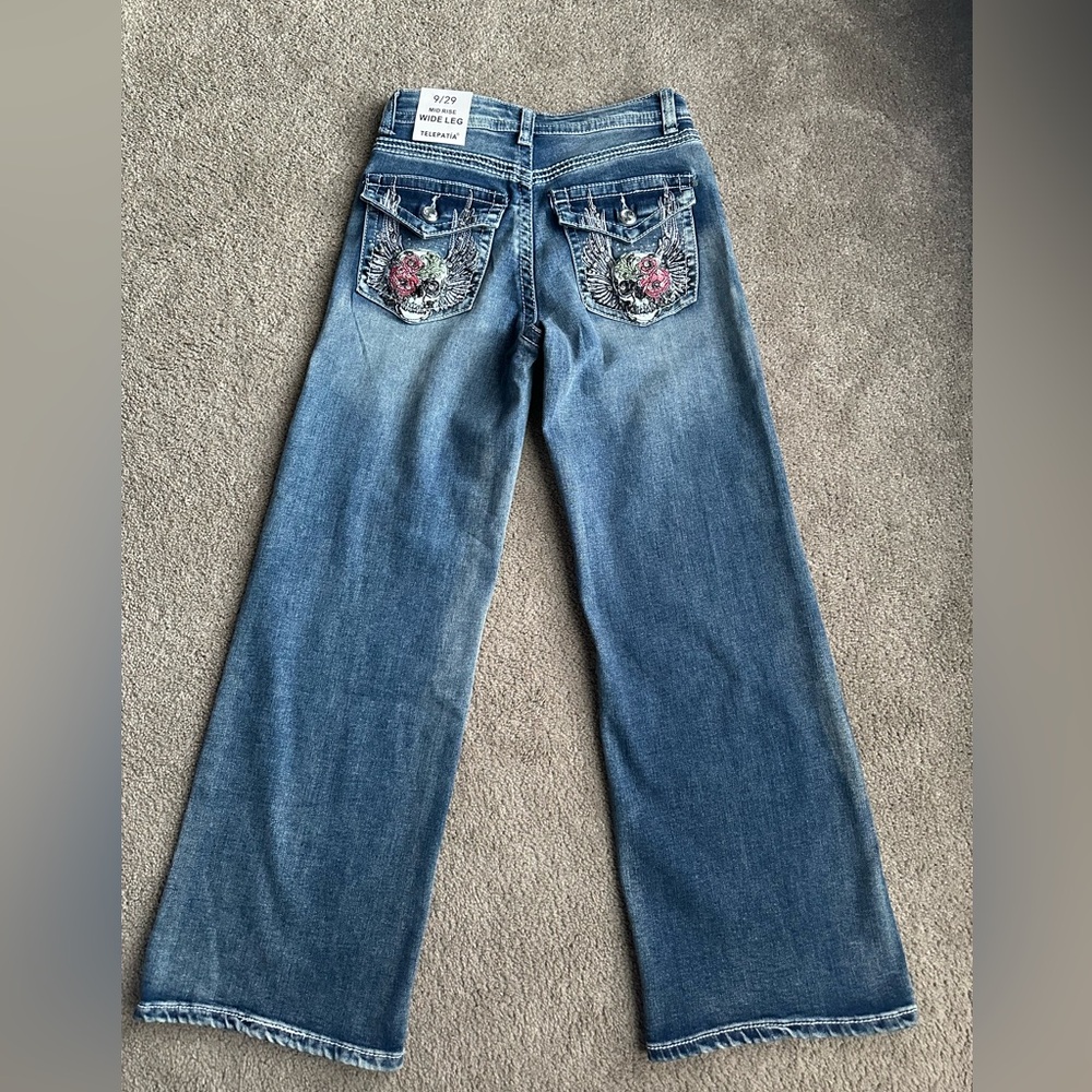 Telepatia mid rise wide‎ leg Jeans with Embellished Pockets